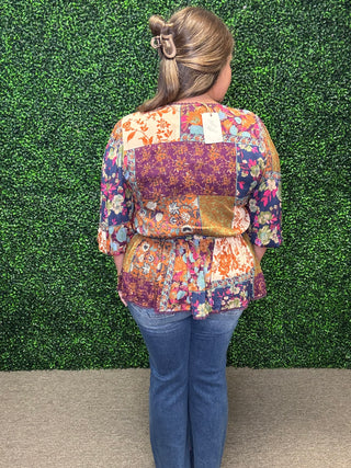 FLORAL PRINTED RAYON GAUZE PEPLUM TOP