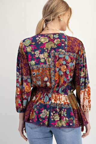 FLORAL PRINTED RAYON GAUZE PEPLUM TOP